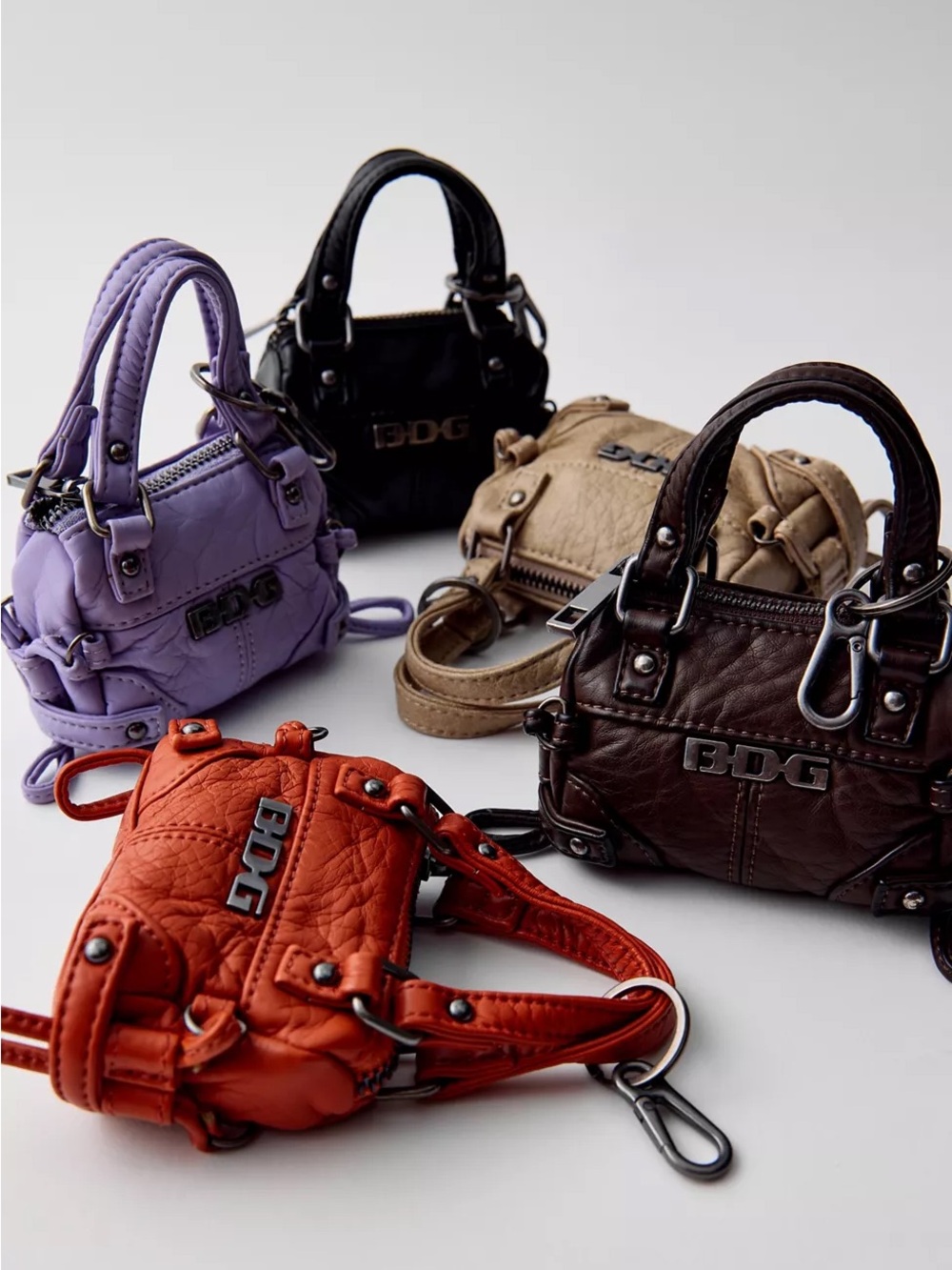 BDG Cindy Shoulder Bag Keychain in blue and neutral only